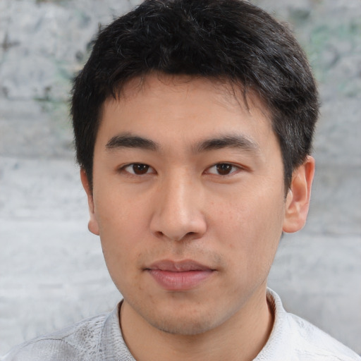 Neutral asian young-adult male with short  brown hair and brown eyes