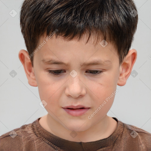 Joyful white child male with short  brown hair and brown eyes