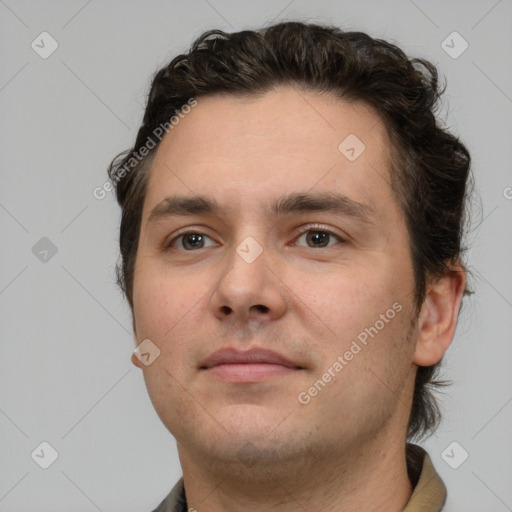 Neutral white young-adult male with short  brown hair and brown eyes