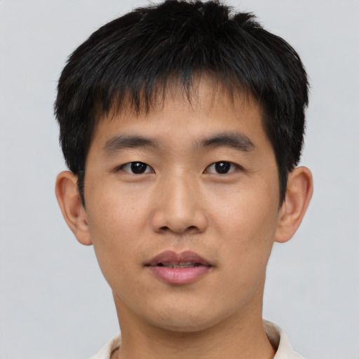Neutral asian young-adult male with short  brown hair and brown eyes
