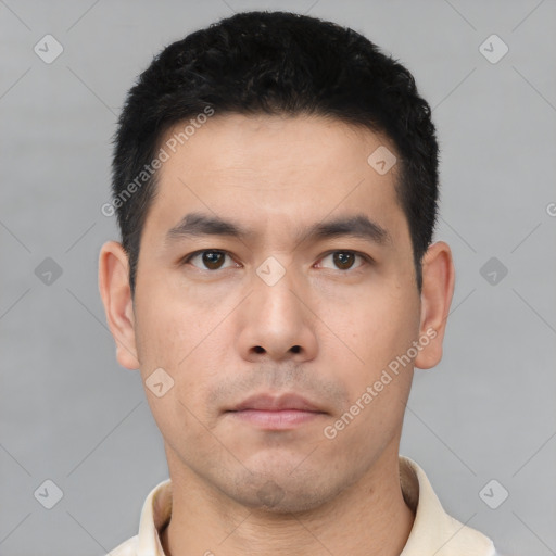 Neutral asian young-adult male with short  black hair and brown eyes