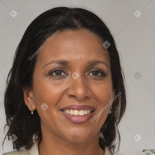 Joyful black adult female with medium  brown hair and brown eyes