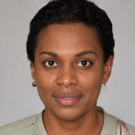 Neutral black young-adult female with short  black hair and brown eyes