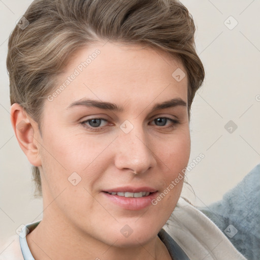 Joyful white young-adult female with short  brown hair and grey eyes