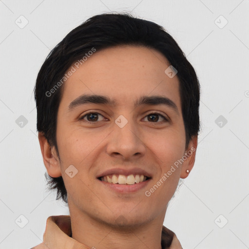 Joyful white young-adult male with short  black hair and brown eyes