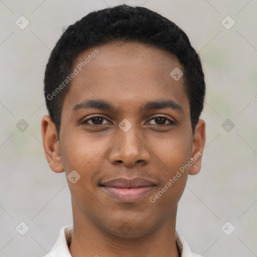 Joyful black young-adult male with short  black hair and brown eyes