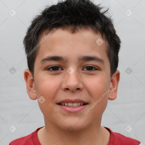 Joyful white child male with short  brown hair and brown eyes