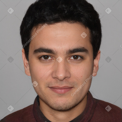 Joyful white young-adult male with short  black hair and brown eyes