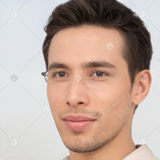 Neutral white young-adult male with short  brown hair and brown eyes