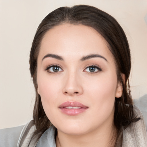 Neutral white young-adult female with medium  brown hair and brown eyes