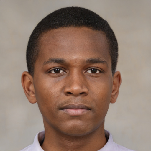 Neutral latino young-adult male with short  brown hair and brown eyes
