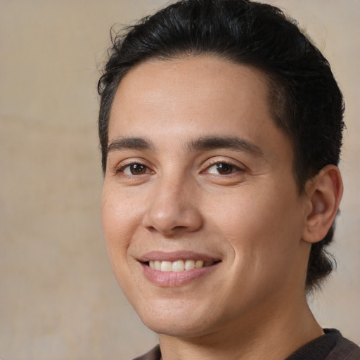 Joyful white young-adult male with medium  brown hair and brown eyes