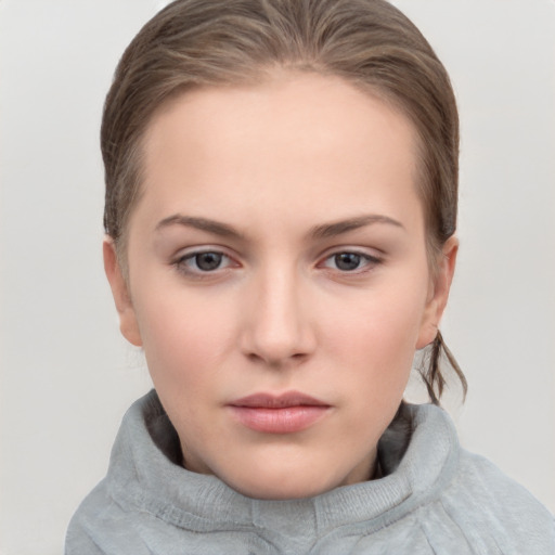 Neutral white young-adult female with medium  brown hair and grey eyes