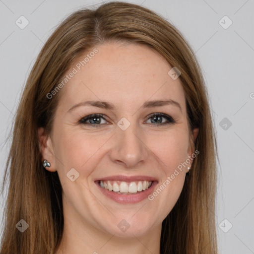 Joyful white young-adult female with long  brown hair and grey eyes