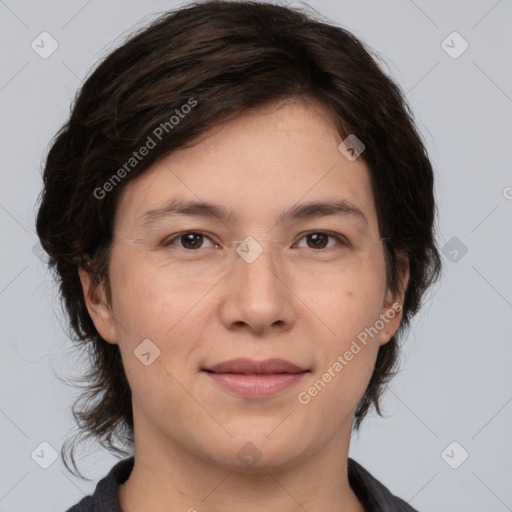 Joyful white adult female with medium  brown hair and brown eyes