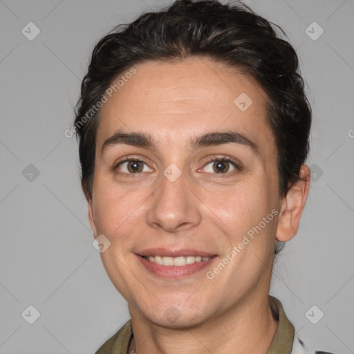 Joyful white adult female with short  brown hair and brown eyes