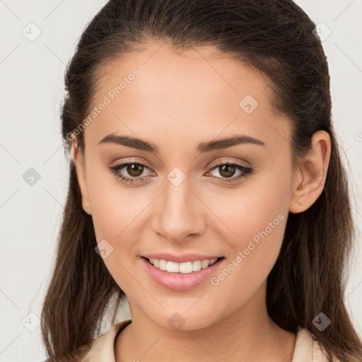 Joyful white young-adult female with long  brown hair and brown eyes