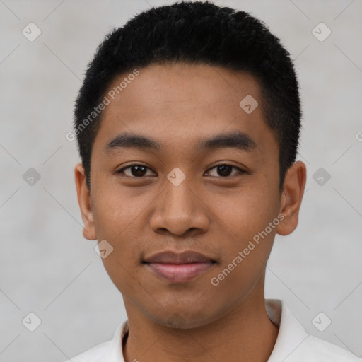 Joyful latino young-adult male with short  black hair and brown eyes