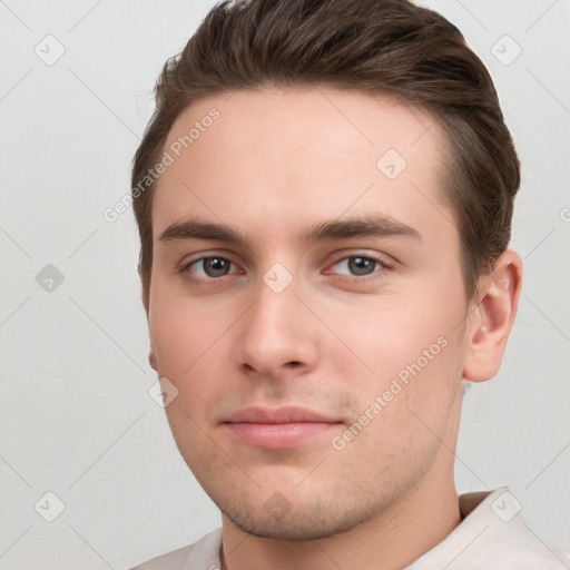 Neutral white young-adult male with short  brown hair and brown eyes