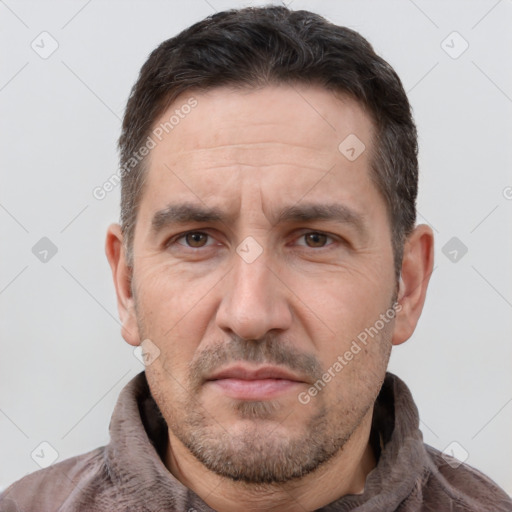 Neutral white adult male with short  brown hair and brown eyes