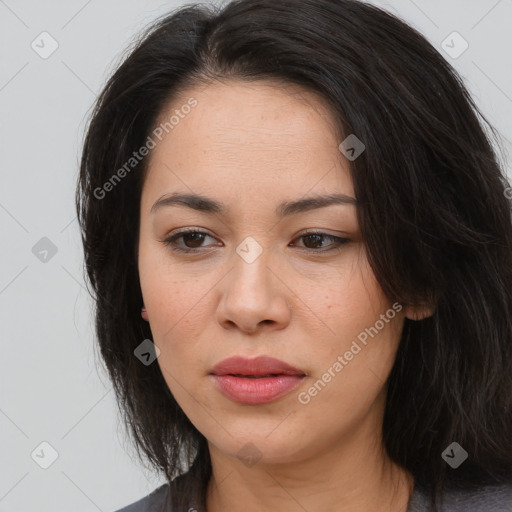 Joyful asian young-adult female with long  brown hair and brown eyes