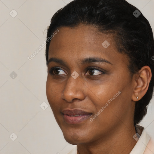 Neutral black young-adult female with short  brown hair and brown eyes