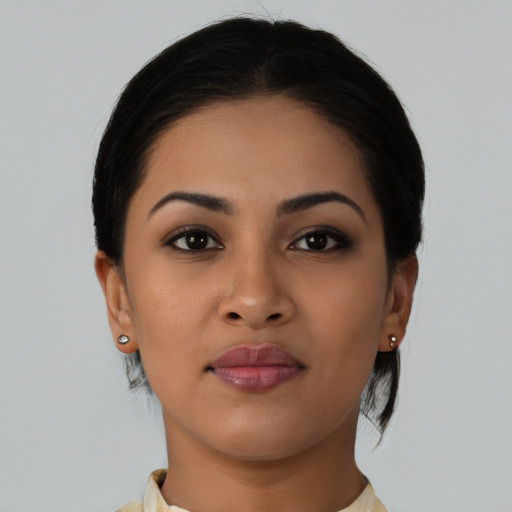 Neutral latino young-adult female with short  brown hair and brown eyes