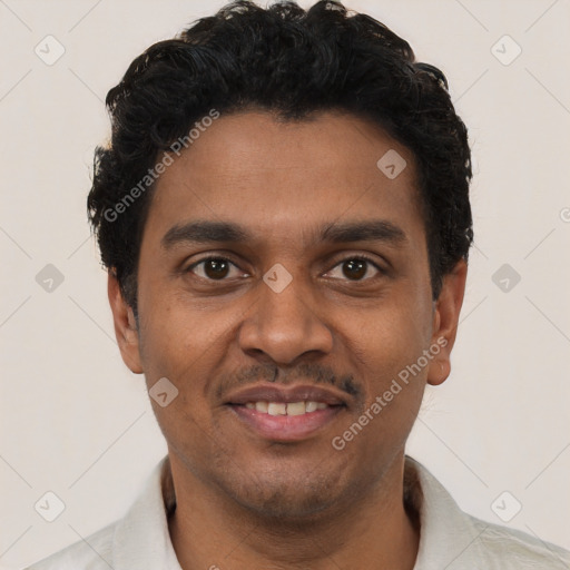 Joyful black young-adult male with short  black hair and brown eyes