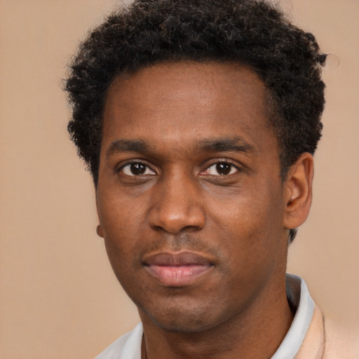 Neutral black young-adult male with short  brown hair and brown eyes