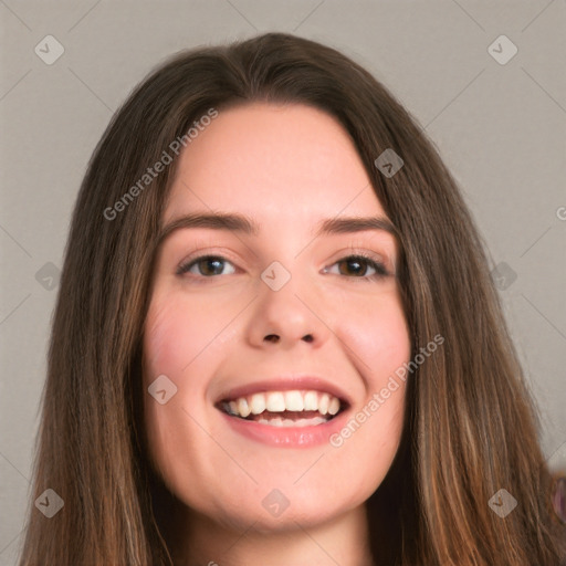 Joyful white young-adult female with long  brown hair and green eyes