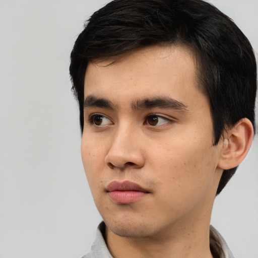 Neutral white young-adult male with short  black hair and brown eyes