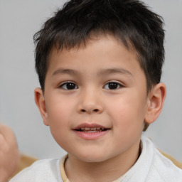 Joyful white child male with short  brown hair and brown eyes