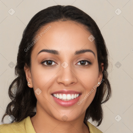 Joyful latino young-adult female with long  brown hair and brown eyes