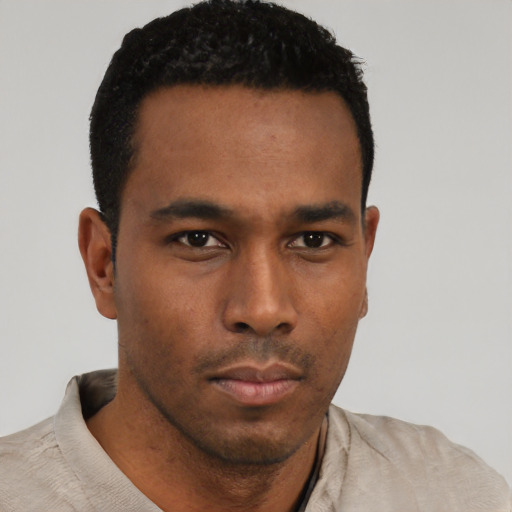 Neutral black young-adult male with short  black hair and brown eyes