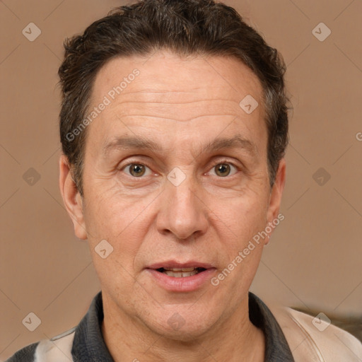 Joyful white middle-aged male with short  brown hair and brown eyes