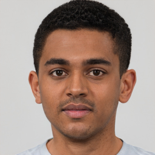 Neutral black young-adult male with short  black hair and brown eyes