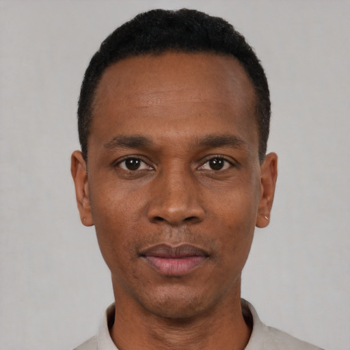 Neutral black young-adult male with short  black hair and brown eyes