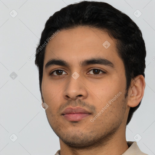 Neutral latino young-adult male with short  black hair and brown eyes