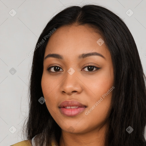 Joyful latino young-adult female with long  black hair and brown eyes