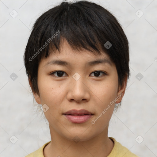 Joyful asian young-adult female with short  brown hair and brown eyes