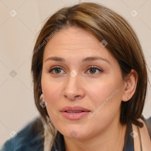 Joyful white adult female with medium  brown hair and brown eyes