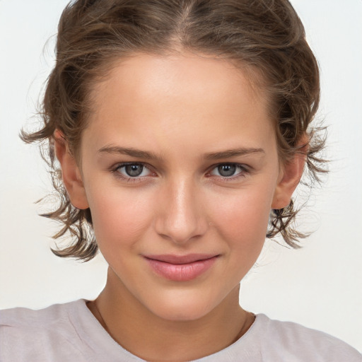 Joyful white child female with medium  brown hair and grey eyes