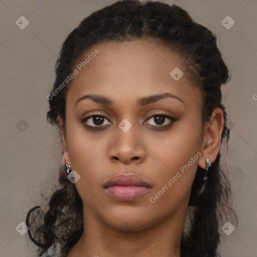 Neutral black young-adult female with long  brown hair and brown eyes