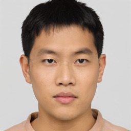 Neutral asian young-adult male with short  brown hair and brown eyes