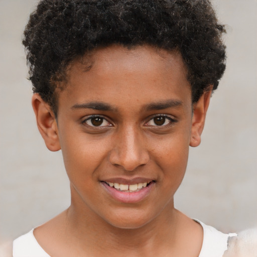 Joyful black young-adult male with short  brown hair and brown eyes