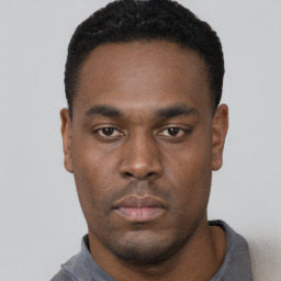 Neutral black young-adult male with short  black hair and brown eyes