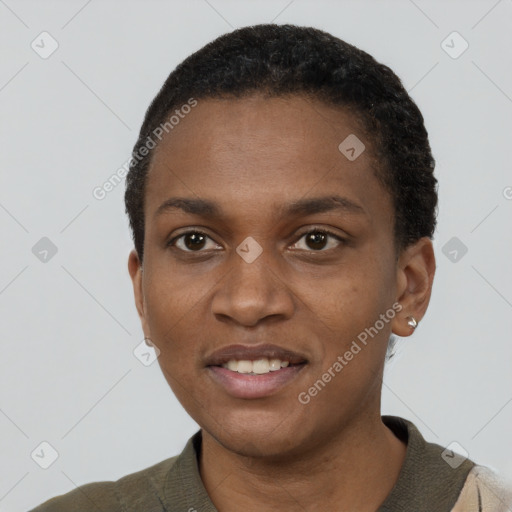 Joyful black young-adult female with short  black hair and brown eyes