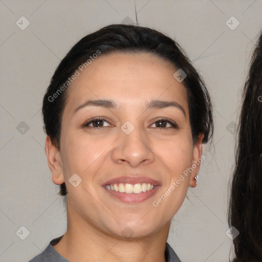 Joyful white young-adult female with long  brown hair and brown eyes