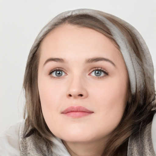 Neutral white young-adult female with medium  brown hair and grey eyes