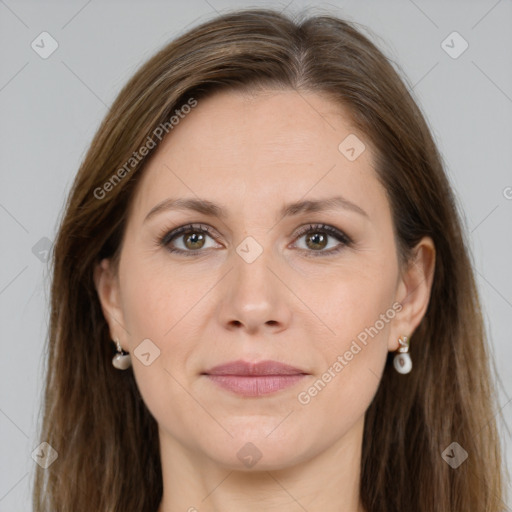 Joyful white adult female with long  brown hair and brown eyes